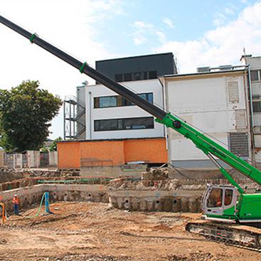 Teleskopkran Sennebogen 653 Raupe Action