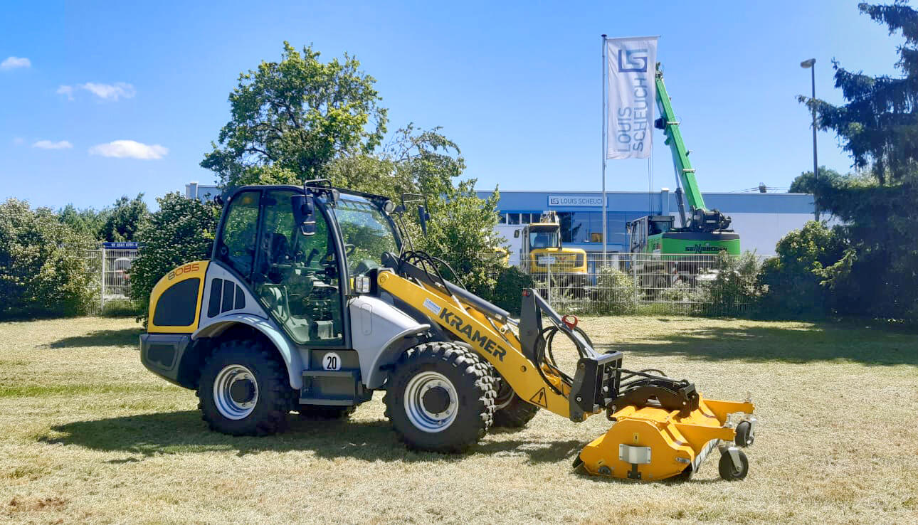 Radlader Kramer 8085 mit Frontmulcher Müthing MU-E Hydro 200